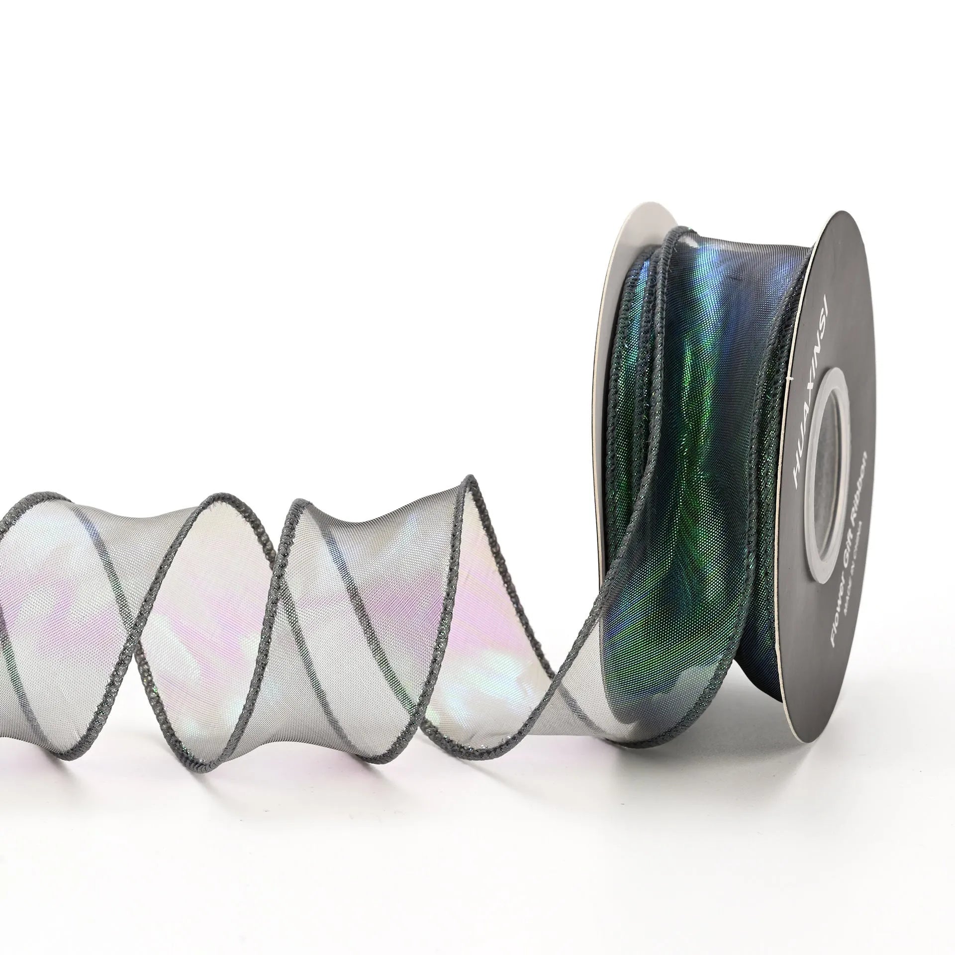 Roll of colourful fishtail yarn mesh decorative ribbon showing wave texture and multiple colour options