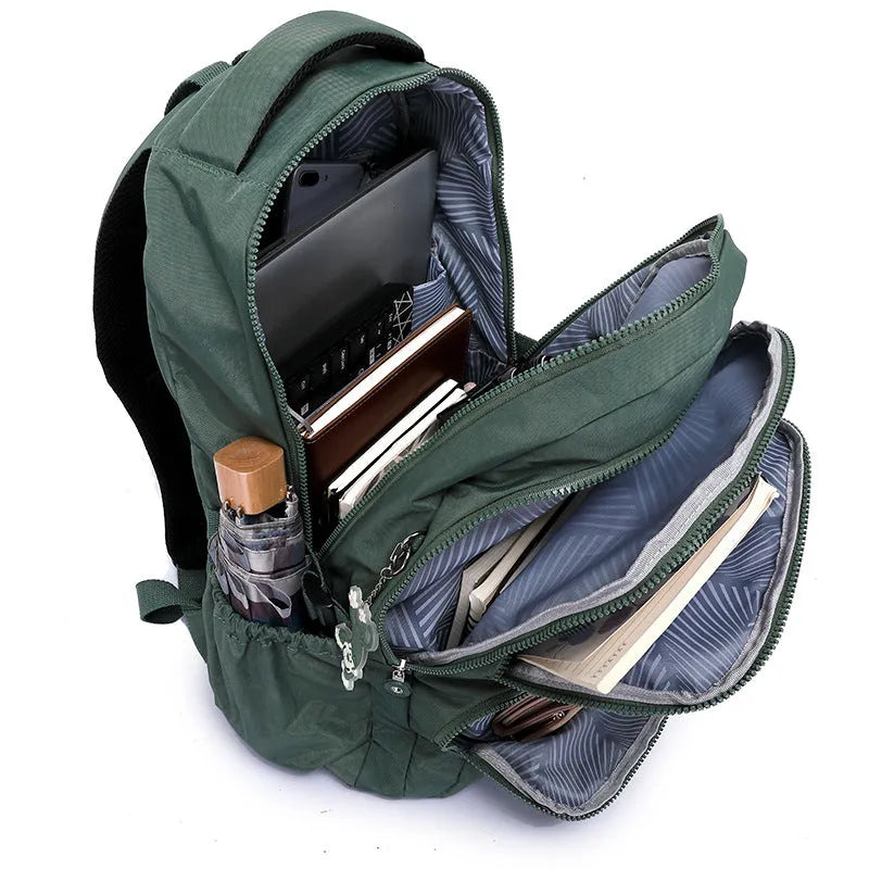 Nylon ultra light outdoor daily travel backpack with curved shoulder straps in olive green colour