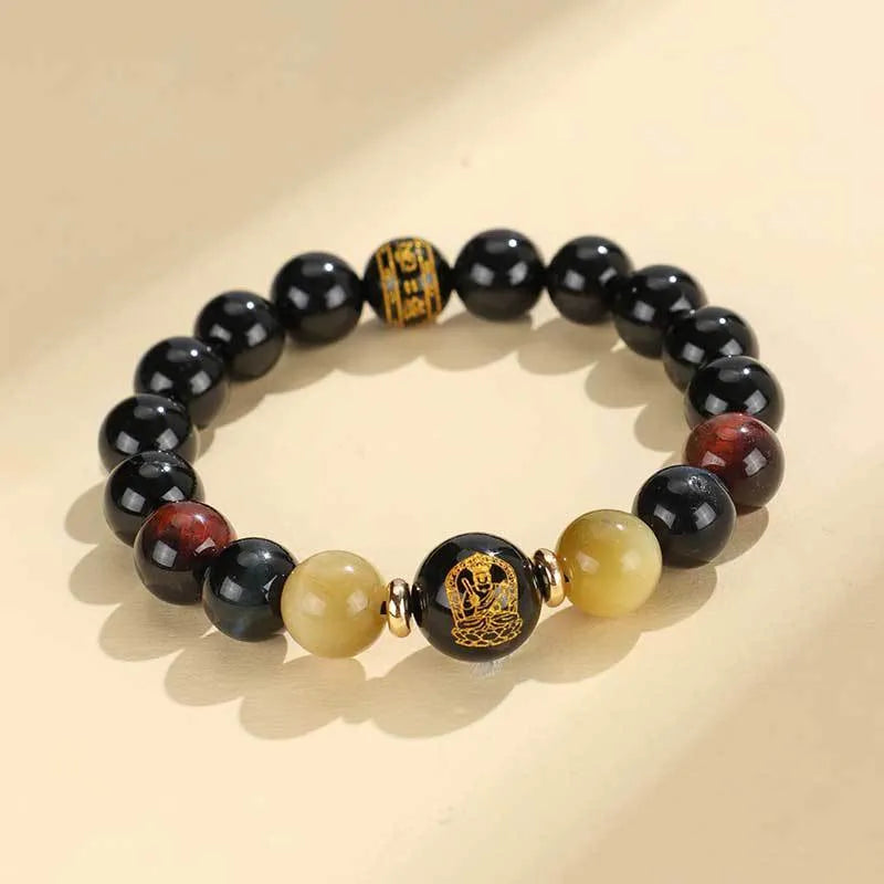 Handmade black agate beaded bracelet with Buddhist carving and tiger eye gemstones