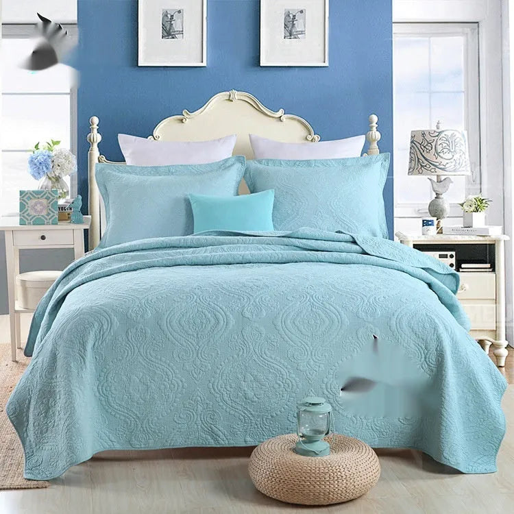 Pure cotton bed cover three-piece set shown in a light colour on a bed, featuring a quilt cover and sheet.