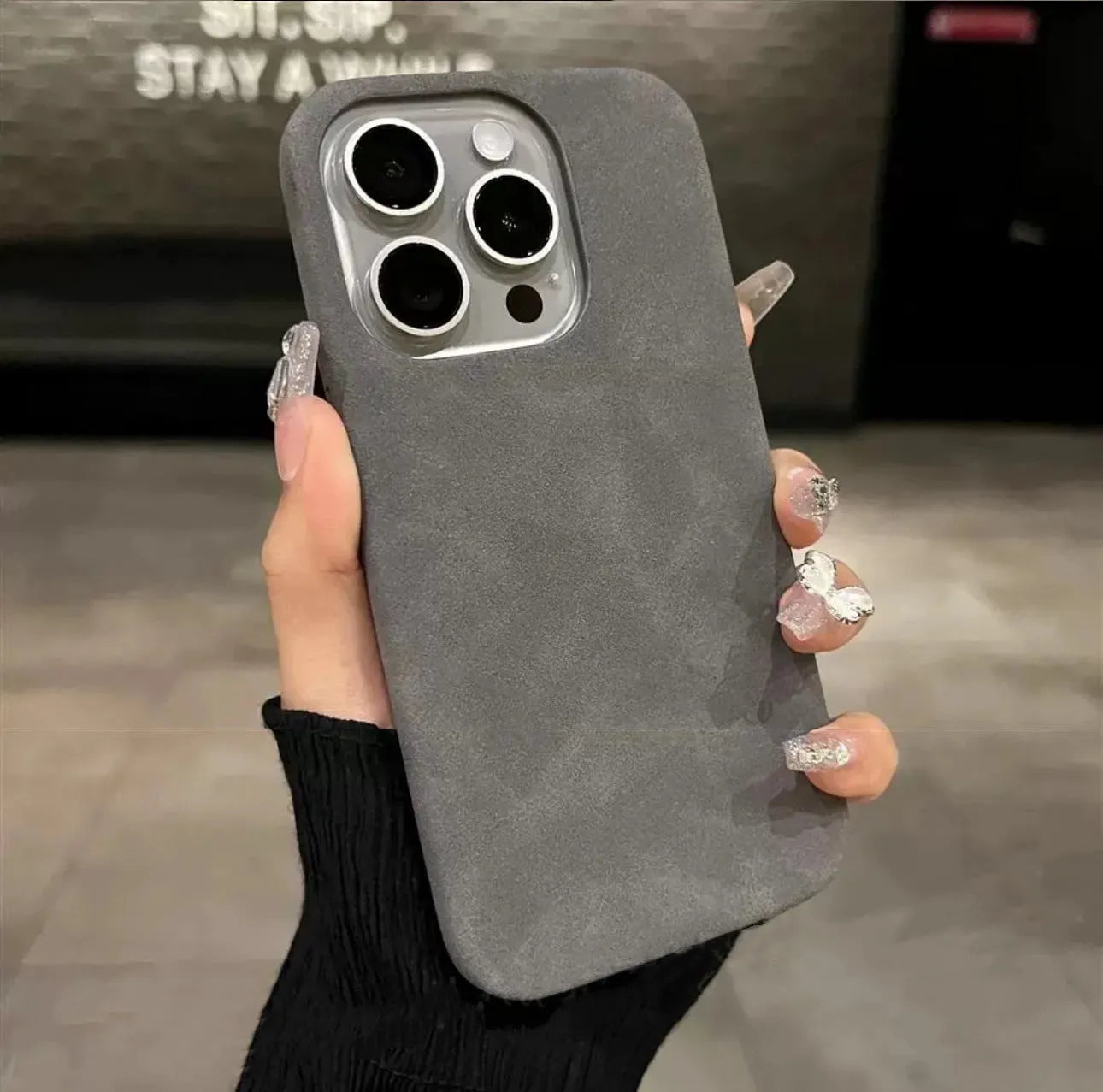 Solid colour suede imitation leather iPhone case in half-pack design showing shockproof protection features