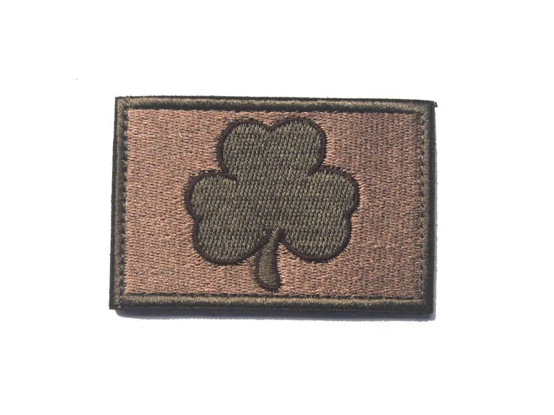 Outdoor embroidered fabric badge with velcro backing showing camouflage design