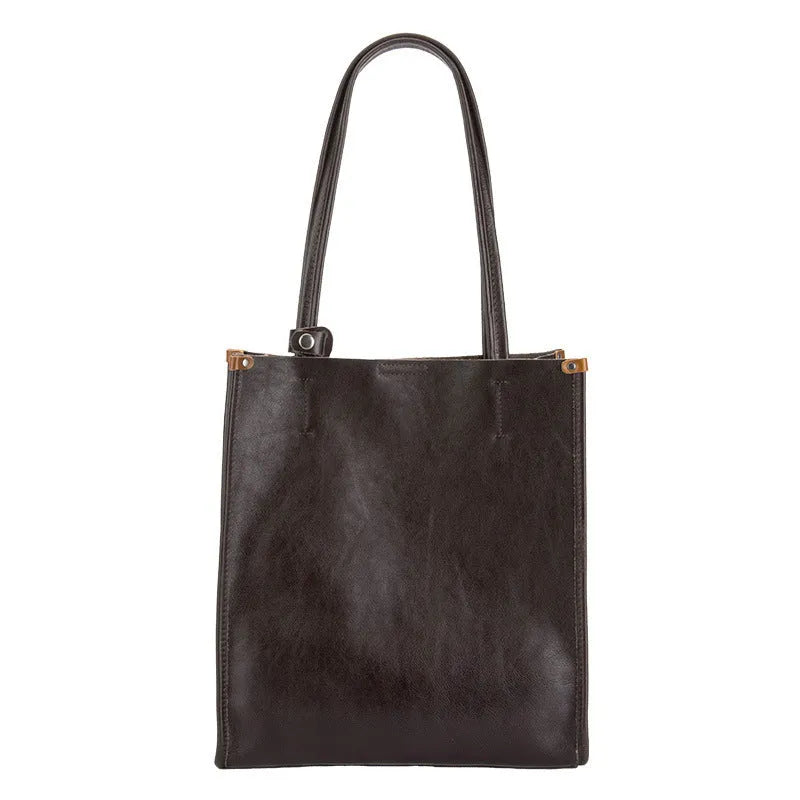 Large capacity genuine leather city commuter shoulder tote bag in black, soft square vertical shape with slit pocket
