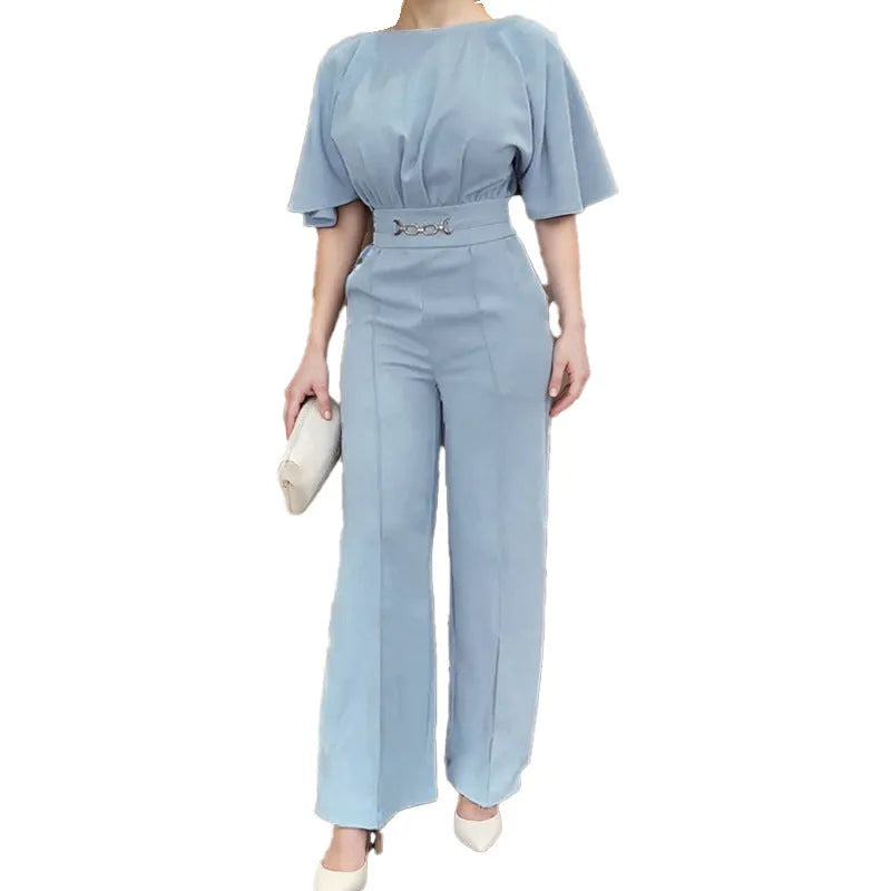 Blue men's two-piece polyester suit set with long-sleeved jacket and trousers on a hanger.