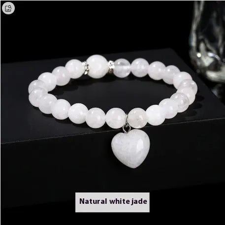 Handmade natural crystal bracelet with six stone types in geometric round beads, showing 8mm and 10mm purity size options