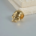 Stainless steel hollow skull Buddha earring in a geometry shape, shown in one of four colour options.
