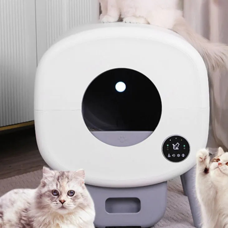 White automatic self-cleaning cat litter box with a large interior and separate waste drawer.