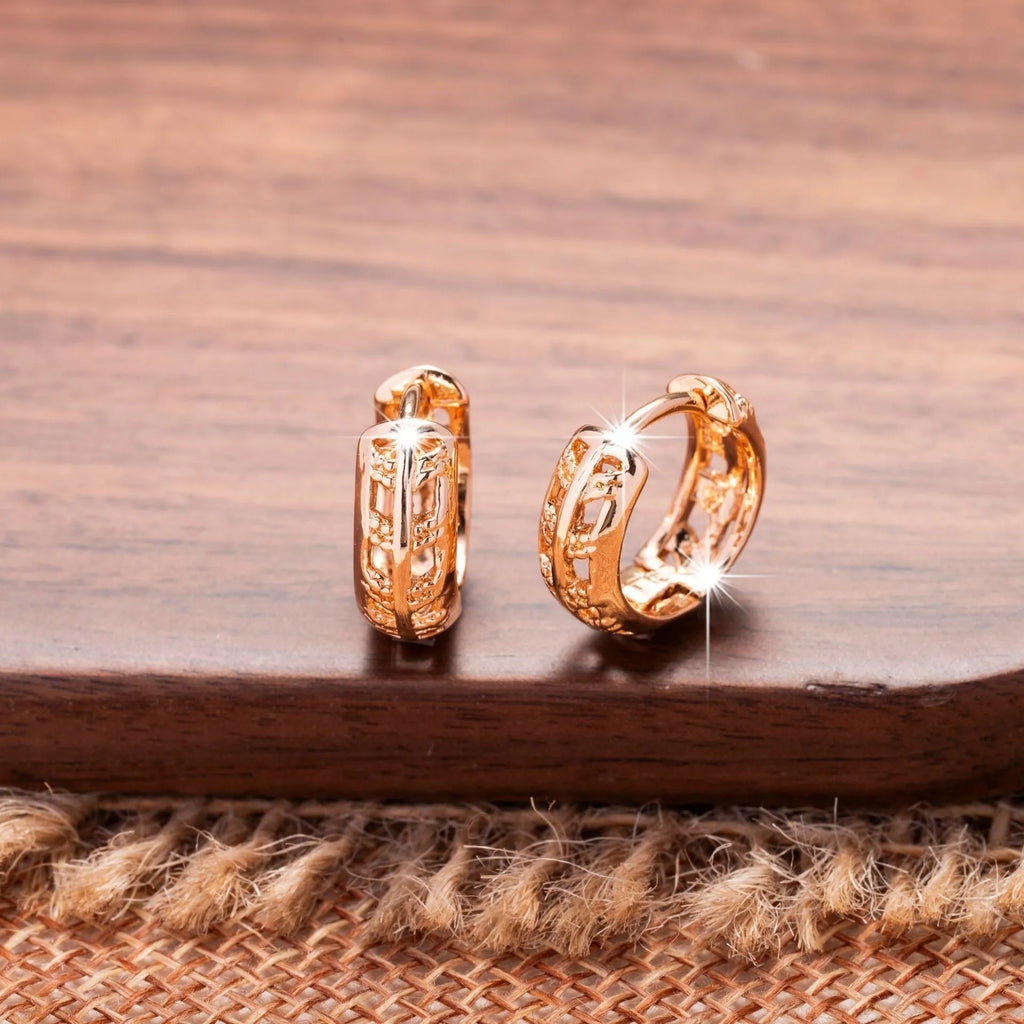 Rose gold copper leaf hollowed out earrings with a heart shape design.