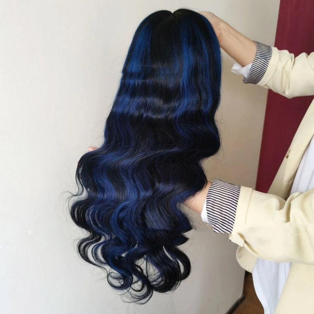 A woman wearing a real human hair lace front wig with a 4x4 lace closure, showcasing long, styled hair.