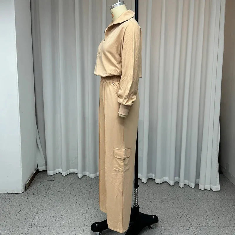 Women's light camel polyester lapel short sleeve top and wide leg trousers two-piece set on a hanger.