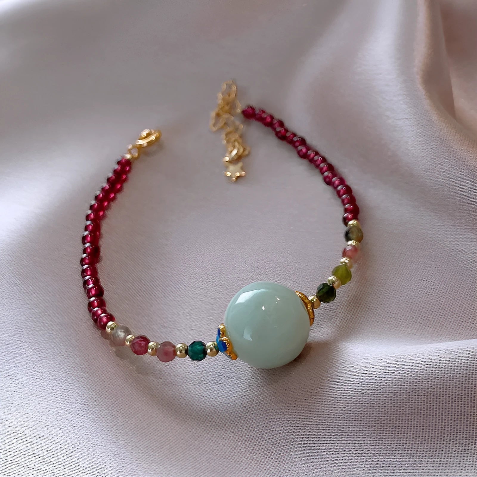 Aquamarine colour tourmaline bracelet with drop shape gemstones and Korean-style design