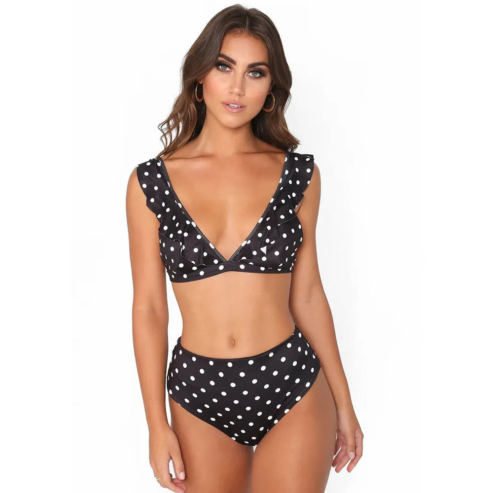 Black and white polka dot print bikini set with deep V-neck top and ruffled design