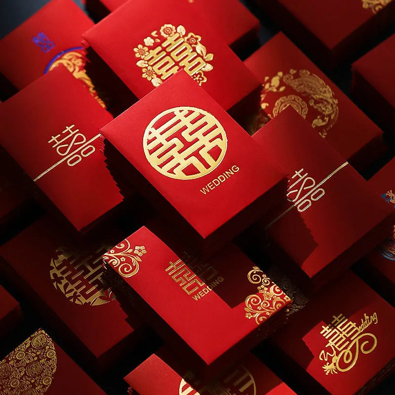 Pack of mini Chinese style wedding red packets in various colours for small cash gifts