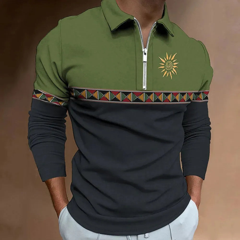 Man wearing a loose-fit long sleeve golf top with retro colour printing and a zipper decoration detail.