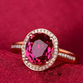 Geometric copper ring with gold-plated inlaid red crystal stones on rose gold adjustable band