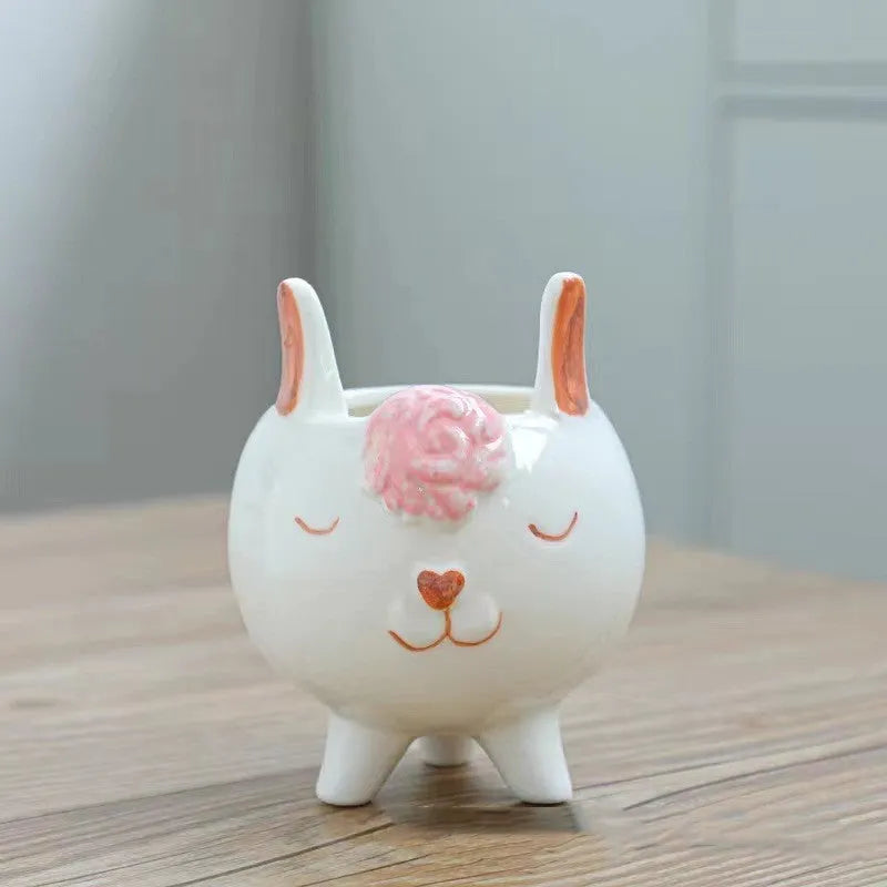 Ceramic succulent flowerpot with hand painted cartoon animal design in colourful pattern