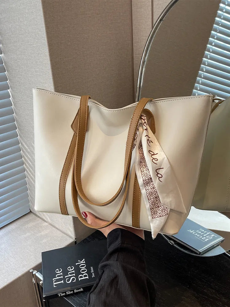 Large capacity bucket-style tote bag in multiple colour options with sandwich pocket exterior
