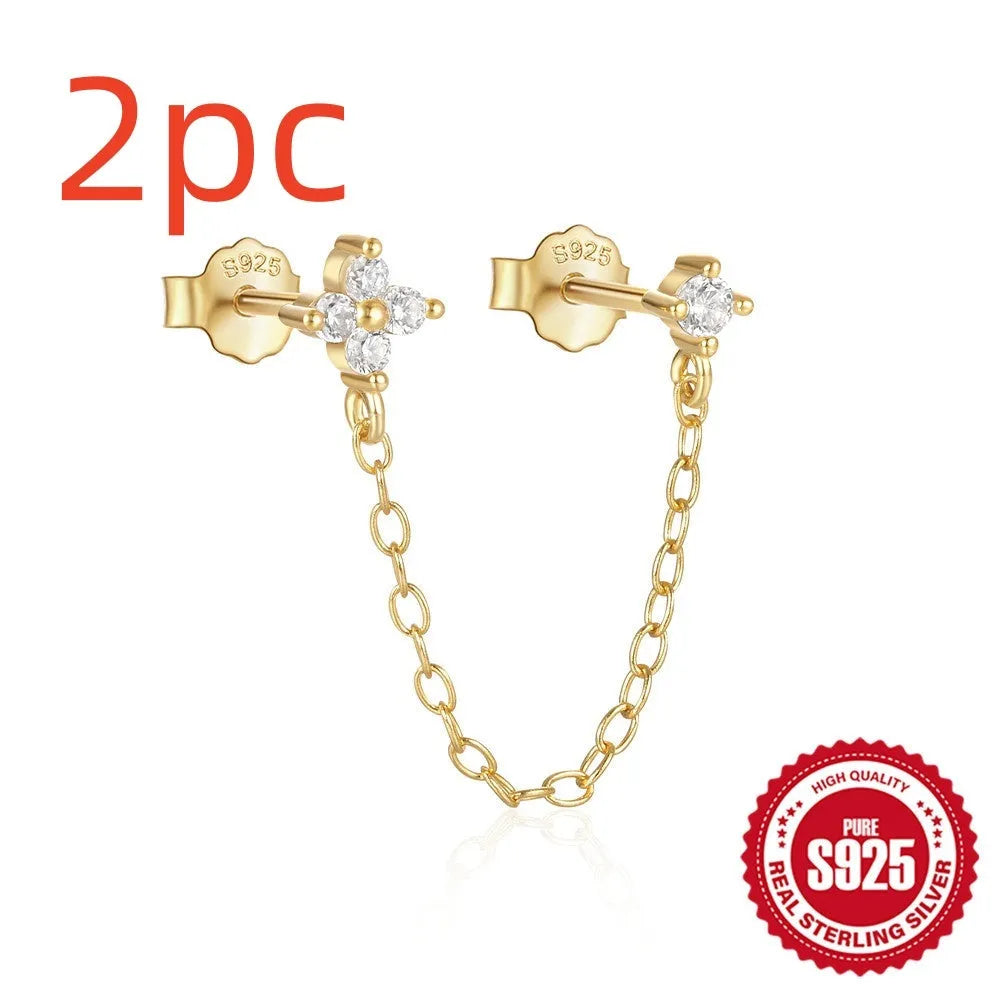 Golden S925 sterling silver stud earrings with a geometric diamond flower and delicate tassel chain design.