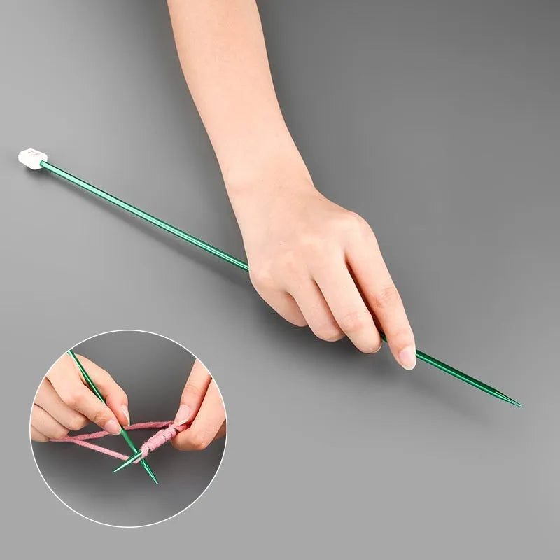 Aluminium crochet hook set showing 14 different sizes with protective plastic caps