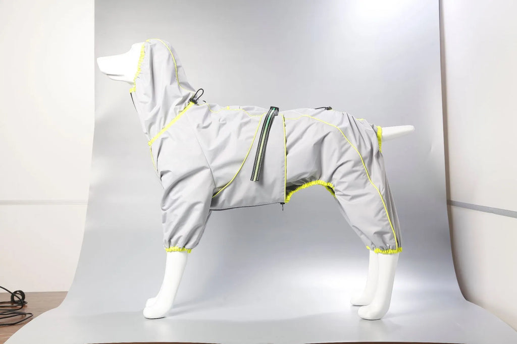 Dog wearing a red thickened cotton-padded winter shell jacket outdoors.