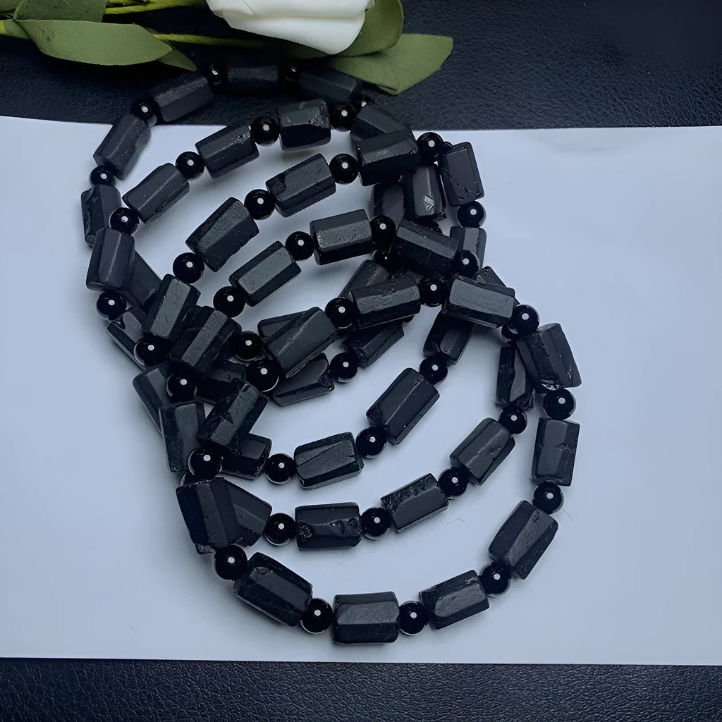Black tourmaline rough stone bracelet with natural textured beads measuring 8.5-9mm and adjustable closure