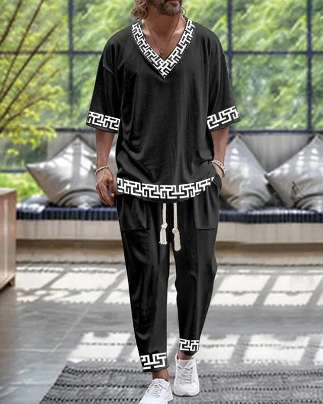 Cropped sleeves V-neck trousers suit in thin polyester fabric with matching top and pants
