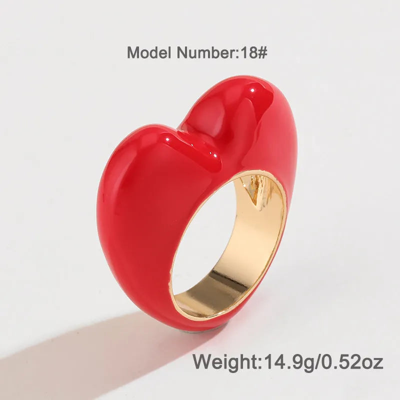 Three-dimensional enamel heart ring in zinc alloy showing raised design detail