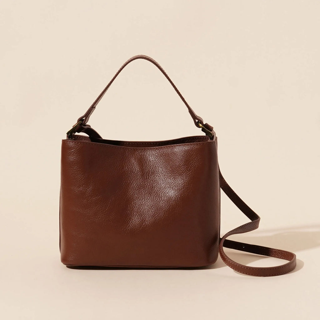 Sugar brown genuine cowhide leather women's vintage shoulder handbag showing square shape and single strap.