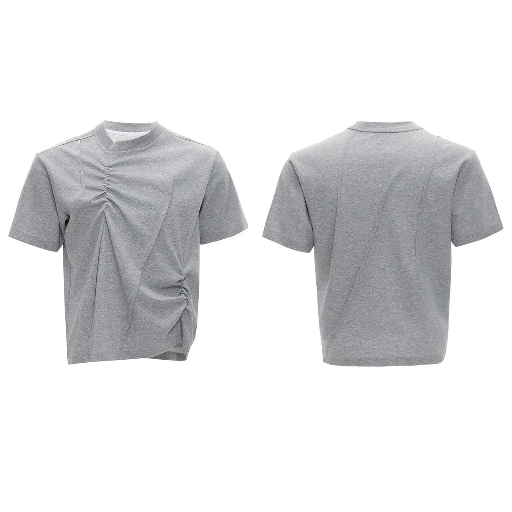 Men's loose grey cotton T-shirt with round neck and asymmetric stitching on the front.