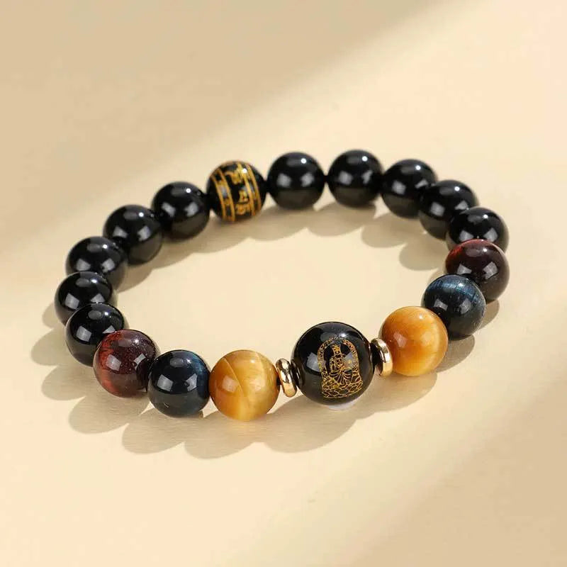 Handmade black agate beaded bracelet with Buddhist carving and tiger eye gemstones