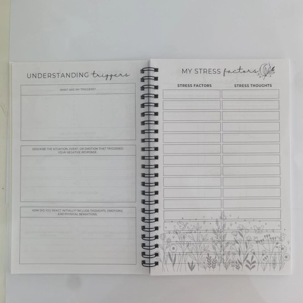 Pink brain mental health planning notepad with coil binding and 80g paper pages