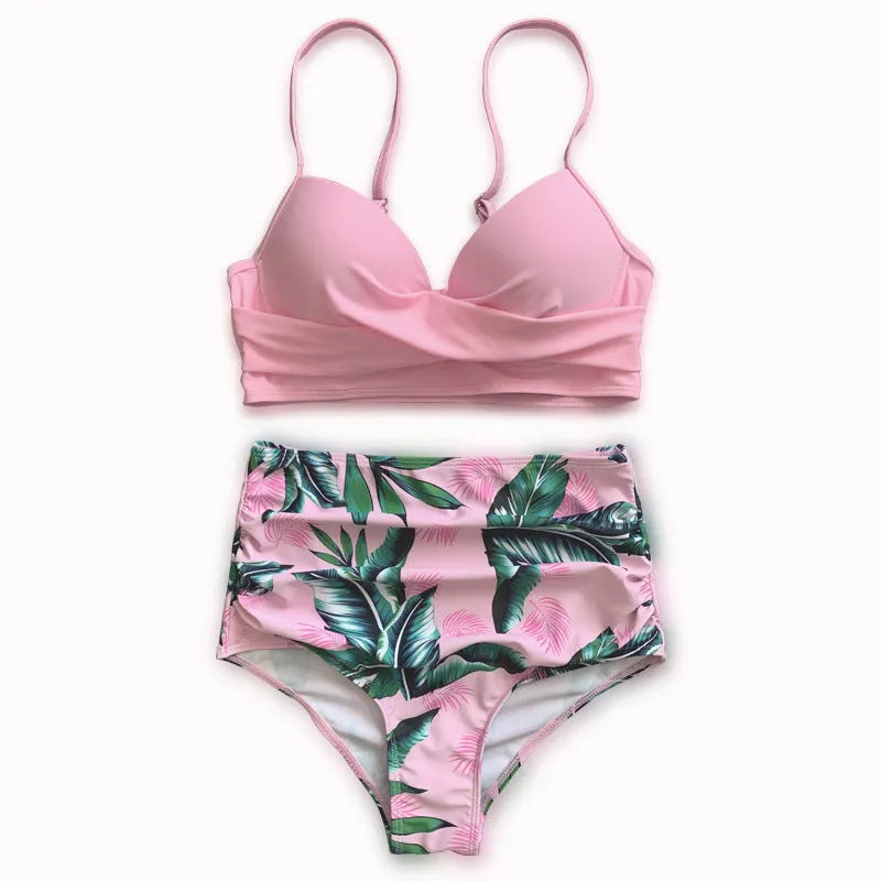 Yellow floral print women's bikini set with push-up bra and high-waist briefs on a mannequin.
