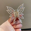 Butterfly-shaped alloy hair clip for women with rhinestone or pearl style decoration