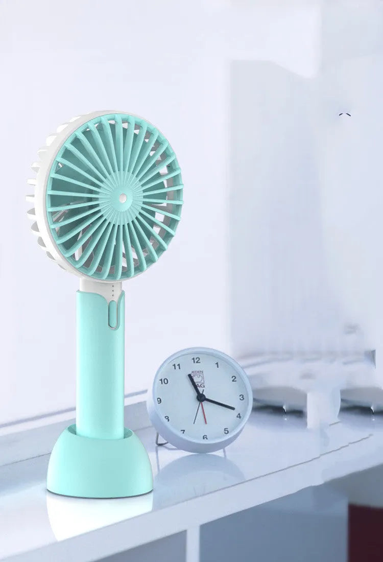 Blue mini USB electric fan with oscillation feature and three-speed control for desktop or handheld cooling