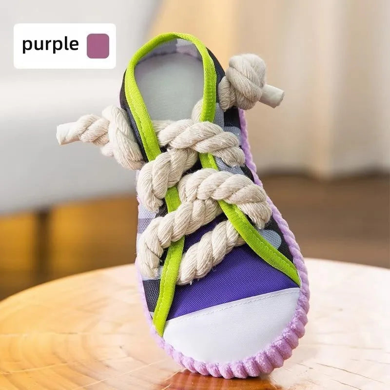 Dog toy shaped like cotton rope slippers with shoelaces, sole patterns, and built-in sound devices for playtime