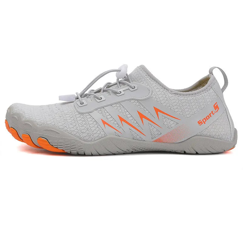 Low-top river tracing shoes in mesh with rubber sole, shown in apricot colour.