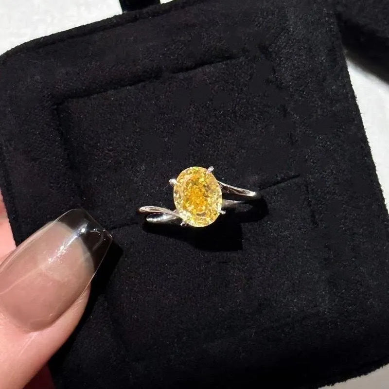 Women's yellow rock sugar copper ring on a neutral background showing bright yellow finish