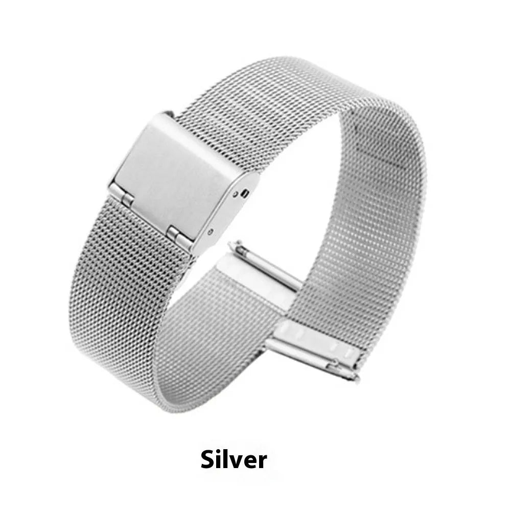 Close-up of a woven stainless steel watch band in silver showing textured metal links.