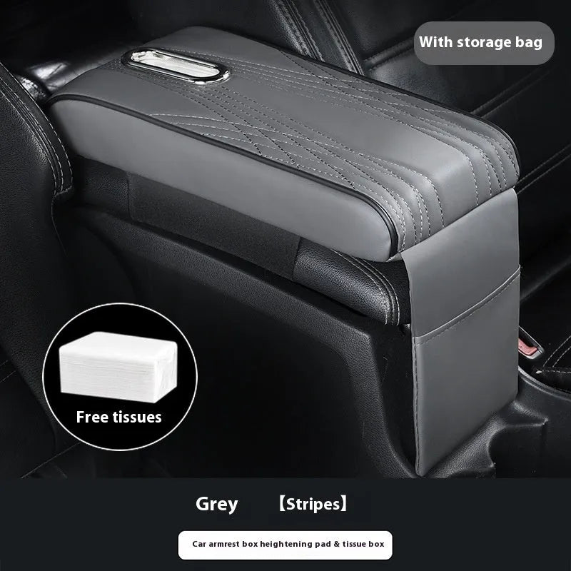 Black leather car armrest cover with angel pattern tissue pocket placed on a vehicle center console