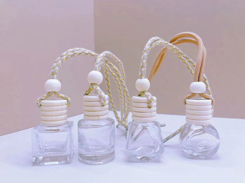 Glass car perfume pendant fragrance showing cylinder, diamond, flat drum and square container style options