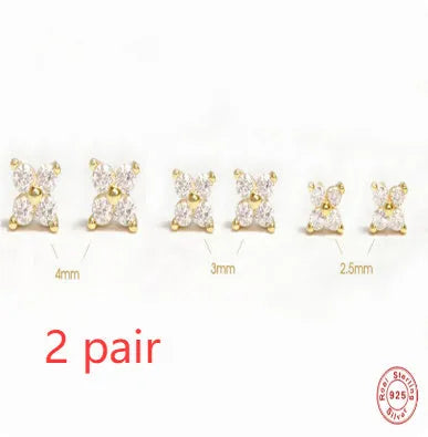 S925 sterling silver stud earrings with a geometric crystal flower design in gold or platinum plating.