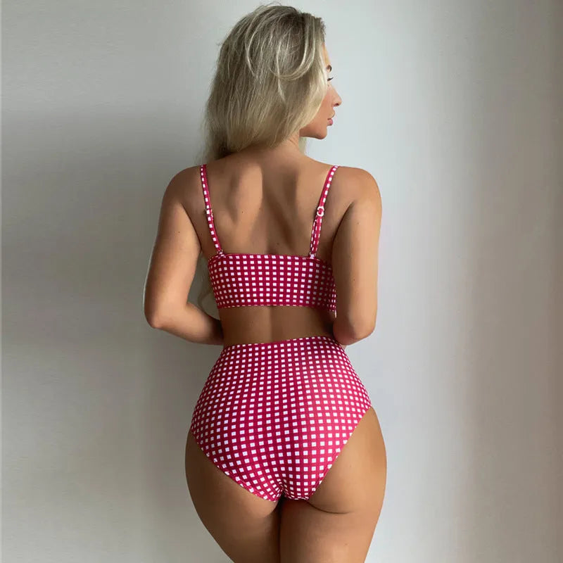 Women's plaid print bikini swimsuit with high-waist split design briefs and coordinating top.