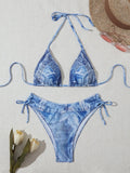 Women's denim blue printed bikini set with strappy design, two-piece swimwear for beach and pool