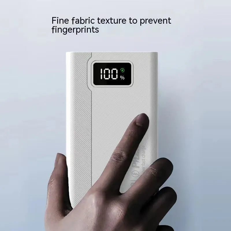 Large capacity power bank in black or white colour with plastic shell, showing front view with dimensions