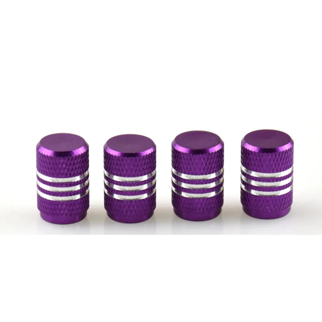 Set of stainless steel car tyre valve caps in assorted colours: black, red, blue, gold, silver, green, purple, sky blue, grey, orange.