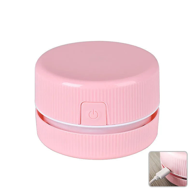 Portable mini desktop vacuum cleaner in blue colour with handheld design