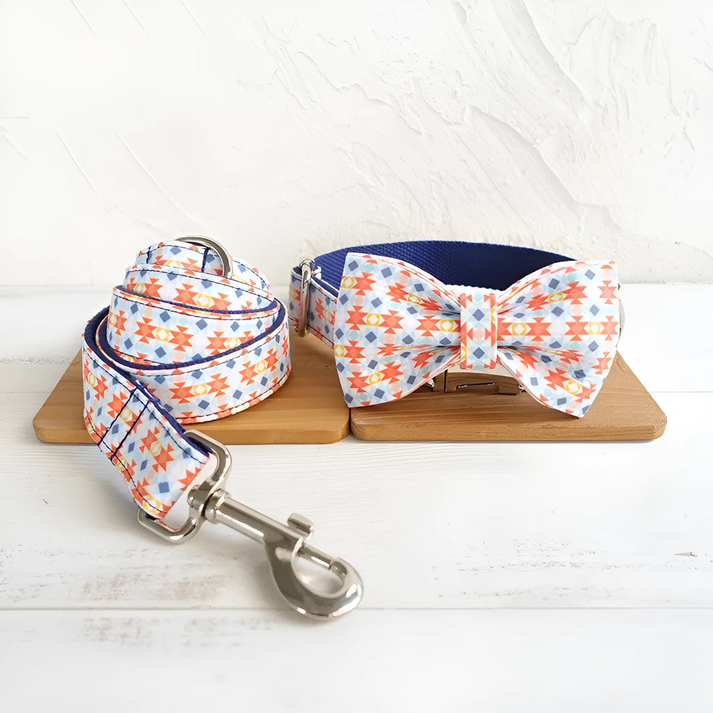 Dog bow collar in Lantern colour with attached bow and traction rope, polyester construction, size options XS to XL