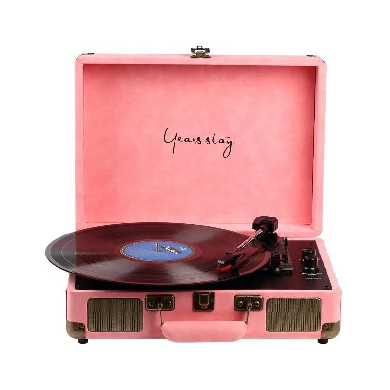 Leather-cased portable Bluetooth turntable for vinyl and film records in multiple colours.