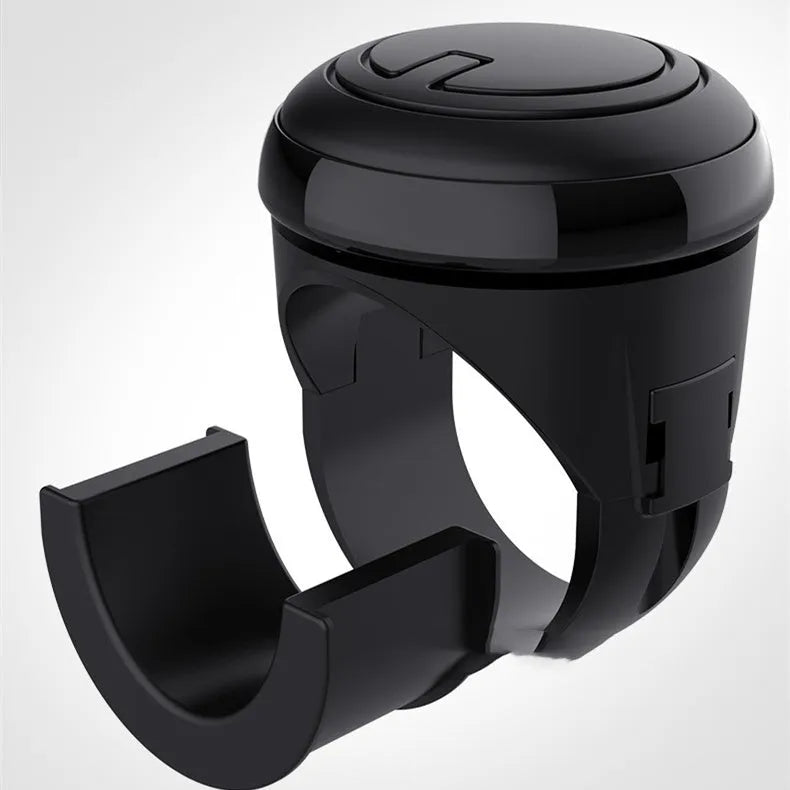 3R steering wheel booster in black with ABS metal bearing silicone construction, 19.5x12.5x4cm, on a car steering wheel