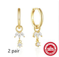 S925 sterling silver geometric earrings with golden sunflower zircon inlay for women.